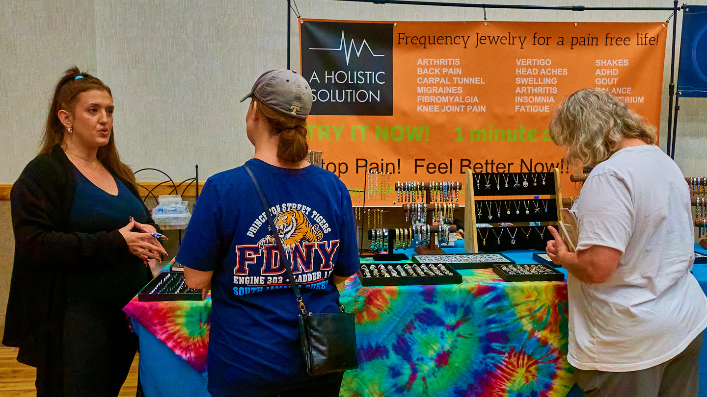 Attendees browsing a vendor display at the Grapevine Wellness Expo, October 10–11, 2026.