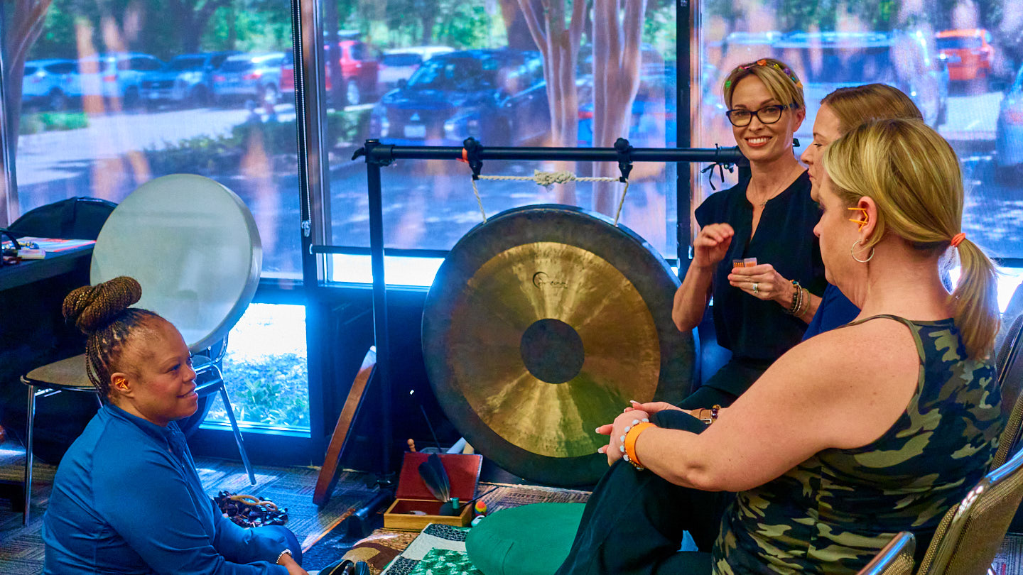 Live sound demonstration with attendees at the Grapevine Wellness Expo, October 10–11, 2026.
