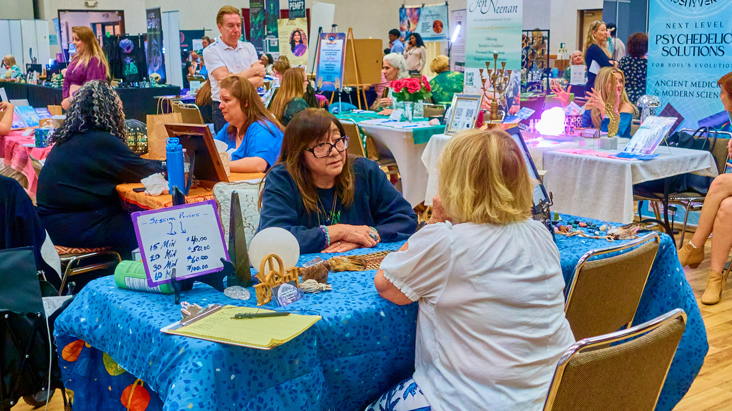 Wide, busy expo-floor conversation scene at the Grapevine Wellness Expo, October 10–11, 2026.